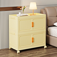 Armoire de rangement pliable en plastique avec portes transparentes et roulettes pour le rangement des vêtements