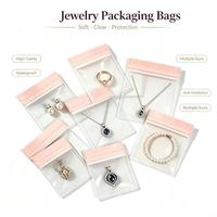 Pochette à bijoux en EVA transparente en gros avec fermeture à pression rose, sac à fermeture éclair en vrac pour détaillants, distributeurs, stockage de bijoux