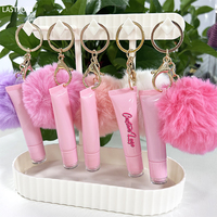 Gloss à lèvres en gros, marque privée, parfum, porte-clés, pompon, gloss à lèvres huileux, repulpeur, transparent, végan, gloss à lèvres pour enfants, porte-clés