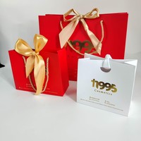 Luxe papieren cadeauzakjes op maat - Gouden foliedruk grote strik cadeauzakjes met touwhandvatten voor Valentijnsdag, bruiloft, feestjes