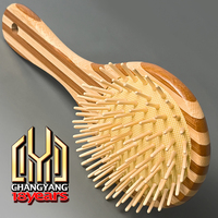 Brosse à cheveux démêlante en bois de bambou Stripe Fashion avec coussin, facile à nettoyer, non jetable, noire, vente en gros, personnalisable