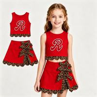Tenues de cheerleaders personnalisées pour filles, tenues sportives sur le thème du ballon, ensembles de hauts à manches courtes et de jupes-culottes imprimées pour équipes de football, ensembles pour le jour du match pour filles
