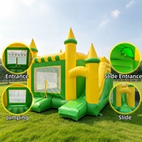 Château gonflable jaune-vert avec toboggans pour les aires de jeux pour enfants, les parcs, les festivals, les activités scolaires