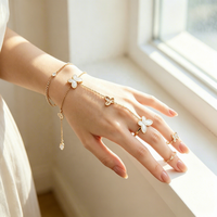 Bijoux XUPING en acier inoxydable plaqué or 14 carats, bracelet de main tendance pour soirée, bague réglable avec breloque