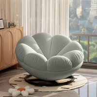 Fauteuil gris de style nordique, élégant, en forme de pétale, pivotant, avec coussin en peluche doux, pour la décoration moderne de la maison et du salon.