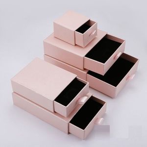 Caja cosmética rígida blanca con logotipo personalizado en lámina dorada y cinta de satén para empaque de perfumes, hecha en Vietnam. - Product Image 2