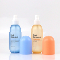 Bouteille de lotion de couleur macaron en plastique PET vide personnalisée de 200ml Bouteilles à pompe de pulvérisation cosmétiques en forme de capsule pour les soins de la peau