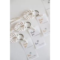 Étiquettes volantes étiquettes de vêtements en feuille d'aluminium Logo personnalisé étiquettes volantes blanches feuille d'or estampage à chaud étiquettes volantes pour jeans et vêtements