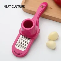 Presse à ail manuelle multifonctionnelle, 1 pièce, râpe à gingembre, outil de cuisine en plastique, éplucheur d'ail