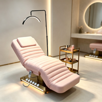 Table de massage électrique de luxe réglable en hauteur avec base lumineuse LED pour salon de beauté, spa, tatouage et extensions de cils