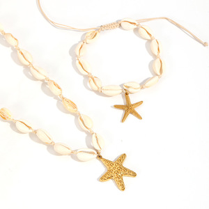 Ensemble collier et bracelet unisexe en acier inoxydable plaqué or 18 carats avec pendentif étoile de mer, style vintage pour vacances à la plage - Product Image 2