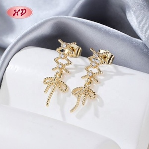 Boucles d'oreilles pendantes élégantes avec nœud en ruban et zircone transparente, fournisseur de bijoux en laiton, Pendientes De Lazo Con Circonia Blanca - Product Image 1