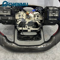 Volant en fibre de carbone fourni par l'usine pour Toyota 2015-2022 Toyota Hilux Corolla Innova Revo Hilux Land Cruiser LC200 LC250