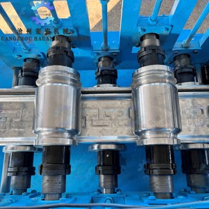 Línea de Producción de Puertas Enrollables de Acero Inoxidable Totalmente Automática, Controlada por PLC, con Componentes Motorizados - Product Image 5