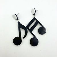 Boucles d'oreilles pendantes asymétriques en acrylique, motif note de musique tendance, vente en gros transfrontalière