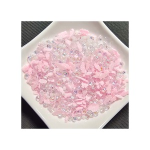 Vente en gros de bonbons sucrés en argile polymère de couleur rose pastel pour boules à neige, remplissages de slime - Product Image 1