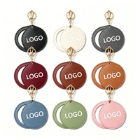 Miroir de poche rond en gros avec porte-clés, couvercle en cuir végétalien pivotant, logo personnalisé, marque privée, mini miroir portable pour sac