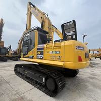 Excavatrice sur chenilles hydraulique d'occasion Komatsu PC220 22 tonnes, engin de construction d'occasion en stock