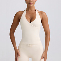 Tops activos de entrenamiento sin costuras transpirables a la moda para mujer Top de Primavera de talla grande PDS incorporado con cuello Halter de compresión
