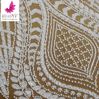 HY2754 nigéria haut de gamme nouvelles perles de luxe blanches paillettes dentelle de mariée avec tissu de robe de mariée en tulle perle