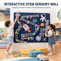 Jeux de mur interactifs sur le thème de l'espace avec tubes et balles, équipement de salle sensorielle, coordination œil-main, aire de jeux intérieure
