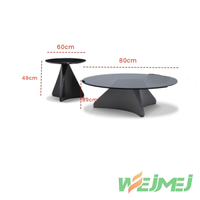 Ensemble de tables basses modernes avec base en acier moulé à la main et plateau en pierre frittée pour le mobilier de salon