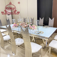 Ensemble table à manger rectangulaire 12 places avec base en métal moderne en acier inoxydable argenté et chaises de luxe pour salle à manger