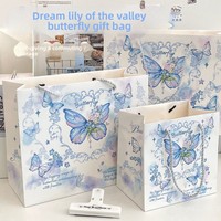 Sac fourre-tout de luxe motif papillon et muguet, style Instagram, motif dessin animé, épaissi, grande capacité, sac en carton blanc offset