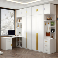 Chambre à coucher personnalisée au design moderne et de luxe Meuble d'armoire en bois en forme de L Armoire d'angle Placard avec table d'étude pour ordinateur