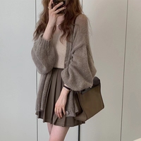 Fournisseur en gros de cardigans en tricot pour femmes, à manches ballon, chauds, doux, élégants et modernes, vêtements d'extérieur