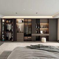 Système de dressing moderne et luxueux sur mesure pour chambre à coucher avec éclairage LED, portes vitrées et armoire en bois