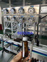 Machine automatique de remplissage et de bouchage de flacons en verre stériles pour sirop, shampoing, riz, liquide oral, avec une productivité élevée