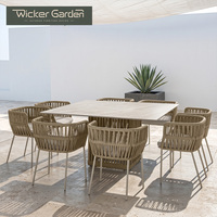 Ensemble de table et chaises de salle à manger d'extérieur en aluminium thermolaqué avec plateau en granit moderne et cordage tressé, résistant aux UV, pour jardin