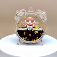 Beliebte niedliche kreative Schwarz gold Astronaut Wecker Schlüssel bund Acryl öl fließende Sand flasche Auto Zubehör Desktop Ornament