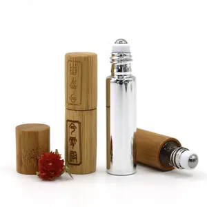 OEM Customizable 10ml Empty Oil Grass Vials with Stainless Ball on Top Perfume Aromatherapy Bottle Roller Bottle Bamboo Wood