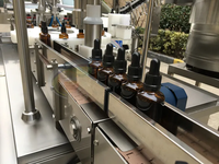 Machine automatique rotative de remplissage, de bouchage et d'étiquetage de flacons compte-gouttes 15ml 30ml 1oz 2oz pour ligne de remplissage de teintures et d'huiles essentielles