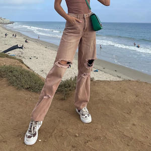 Jeans pour femmes de couleur graduée lavés à l'acide avec trous taille haute pantalon amincissant de couleur unie - Product Image 4