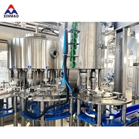 Machine de remplissage et de bouchage entièrement automatique 3-en-1 6000 BPH avec système de filtration d'eau pure minérale