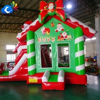Château gonflable à thème de Noël, combo château gonflable avec toboggan pour la décoration d'événements de vacances en plein air