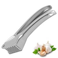 Outil de cuisine professionnel pour la maison, gadget de style nouveau, presse-ail en acier inoxydable 304, écraseur en métal argenté, éplucheur pour légumes