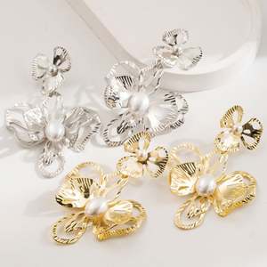 Exquisite Hollow-Out Metal Flower Pearl Female Personality Design High Sense Ear Studs Light Luxury Minority <b>Earrings</b> - Product Image 1