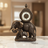Horloge mécanique à mouvement automatique en laiton finition bronze, motif figuratif français antique « Éléphant et son bébé »