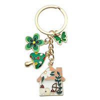 Lot de porte-clés personnalisés en forme de maison de conte de fées, avec breloques émaillées champignon, fleur et papillon, en métal doré, souvenir personnalisé en gros