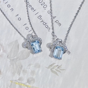 สร้อยคอทองคำแท้ 18k ยี่ห้อซินฟลาย พร้อมจี้รูปโบว์ประดับเพชรอะความารีน - Product Image 4