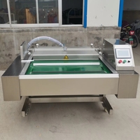 Machine d'emballage sous vide électrique automatique continue pour maïs sucré et emballage de sachets de pattes de poulet