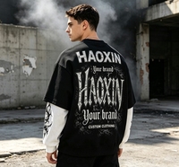 T-shirt graphique à manches longues en coton épais avec épaules tombantes, style superposé, haut tendance pour vêtements urbains masculins OEM
