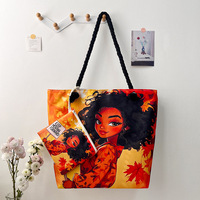 Sac fourre-tout décontracté noir pour femmes en stock avec pochette fermeture à glissière imperméable à l'impression de dessins animés africains pour femmes