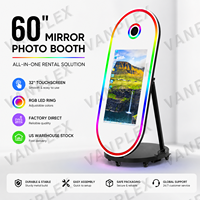 OEM ODM Photobooth Miroir Magique Ovale 60 pouces avec Écran Tactile 32 pouces, Appareil Photo Reflex Numérique et Impression Instantanée, Éclairage LED RGB pour Location d'Événements