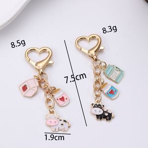 Nouveau porte-clés en alliage de zinc doré en forme de cœur pour animaux de compagnie, petit pendentif vache, accessoire de sac - Product Image 4