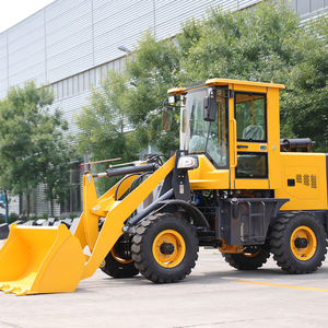 Máy xúc lật bánh xe 4x4 chạy bằng dầu diesel XAC 4 tấn, được trang bị hệ thống thủy lực, có khả năng đào mạnh mẽ và màu sắc vàng. - Product Image 4